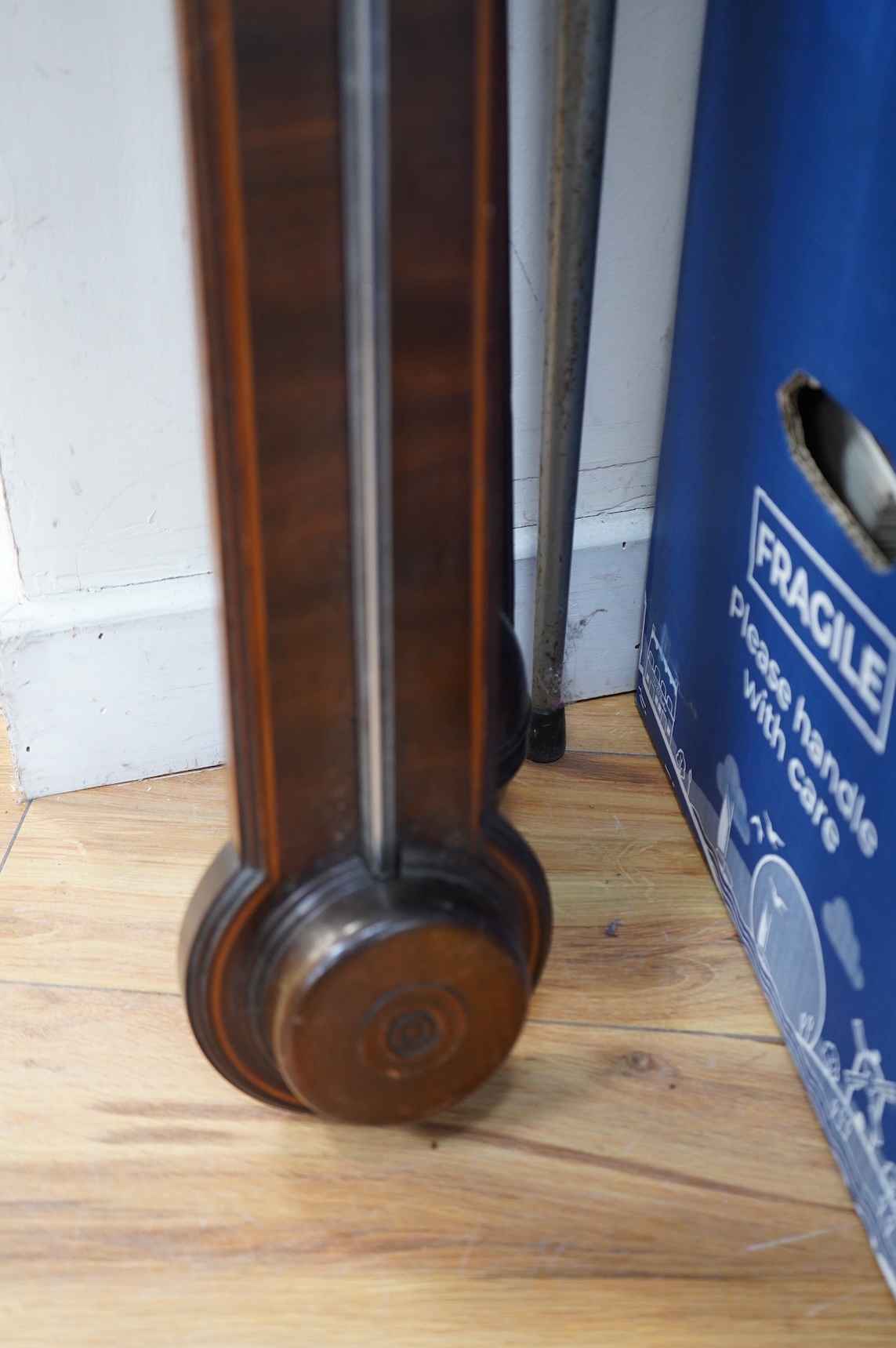 Three George III stick mahogany barometers, one inscribed P Bernardi & Co., 97.5cm high